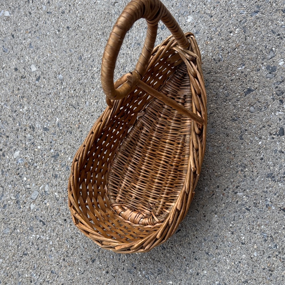 Woven Basket Bag with an elegant, teardrop shape, vintage wicker woven piece